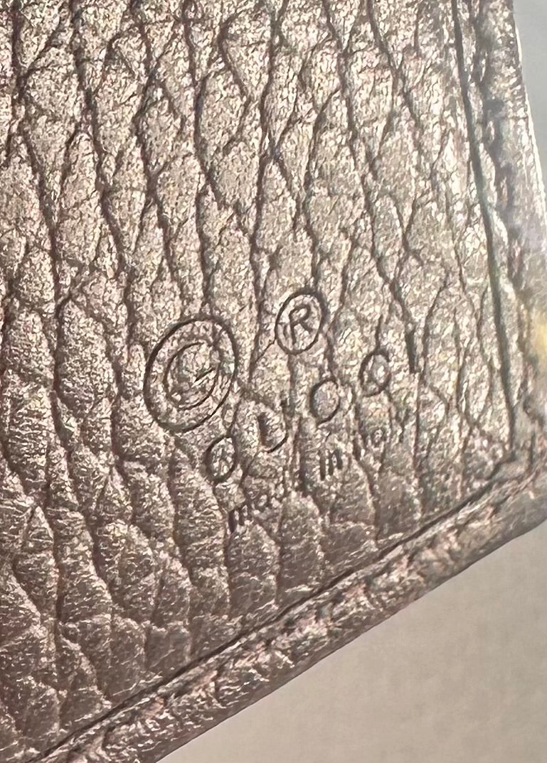 Gucci GG Canvas bi-fold wallet