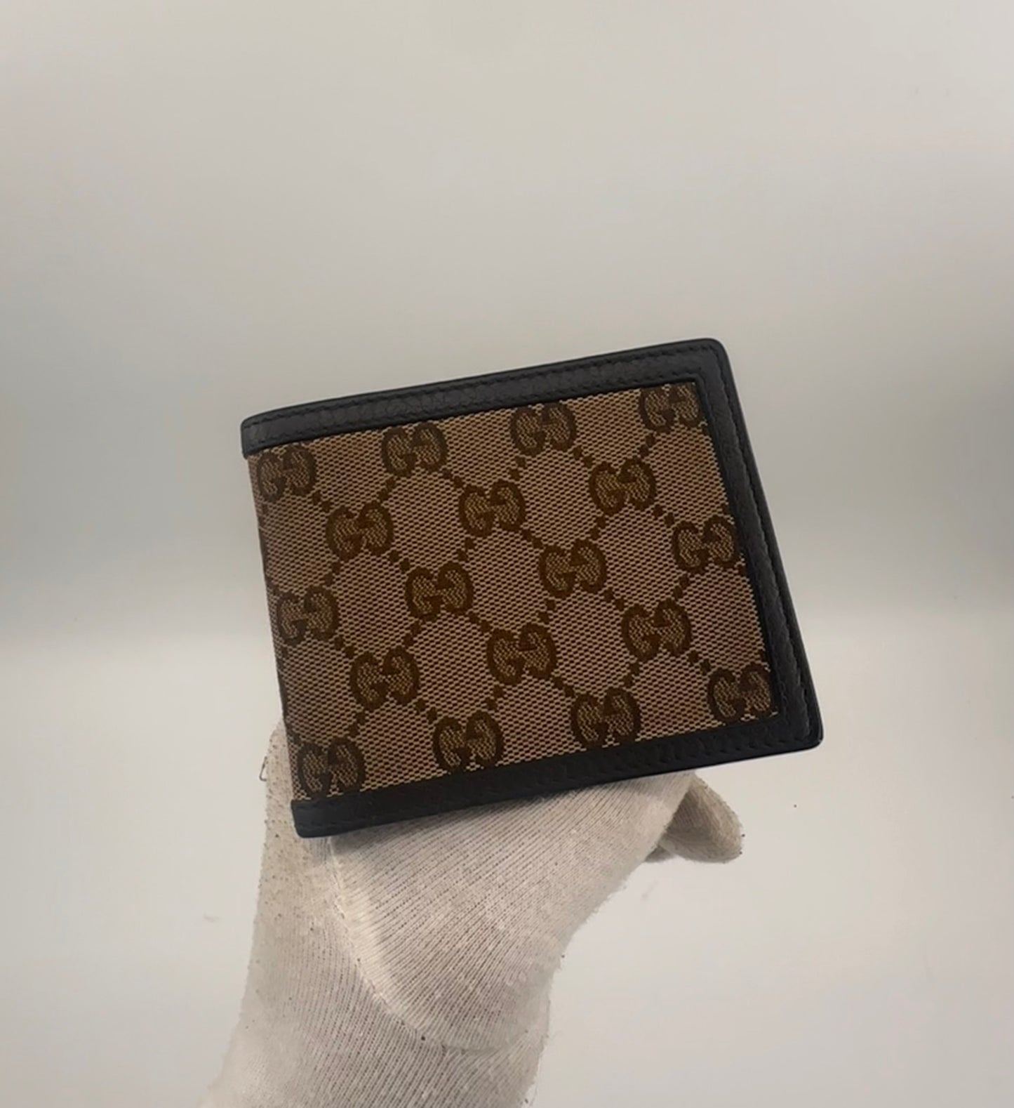 Gucci GG Canvas bi-fold wallet